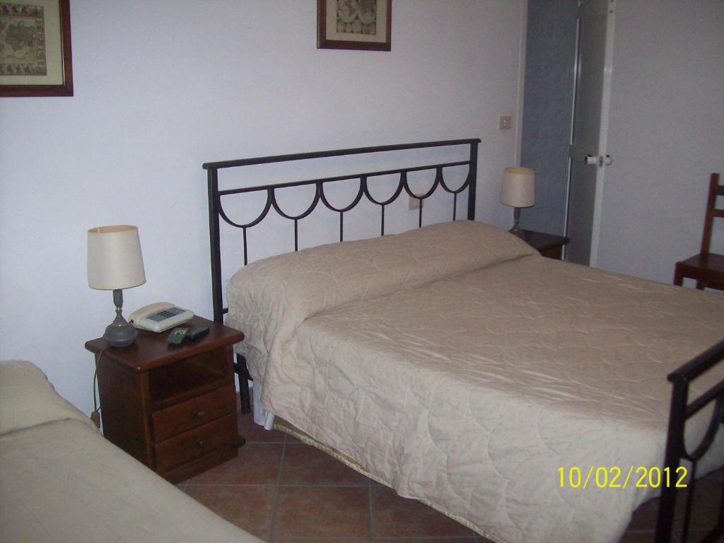 Albergo La Perla Orbetello Værelse billede